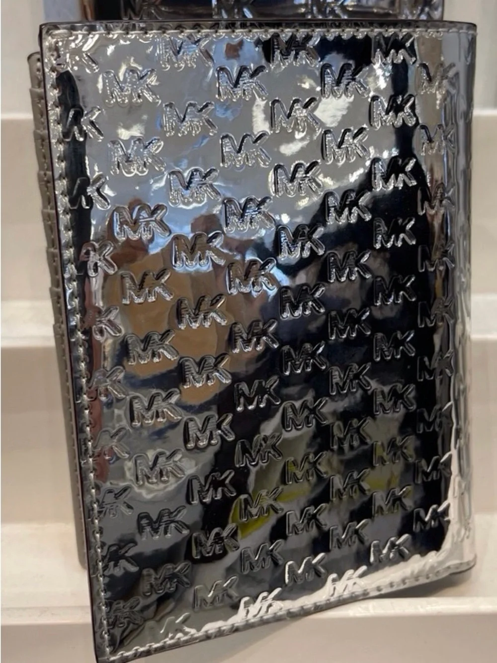Michael Kors Metallic Silver Embossed MK Passport Cover